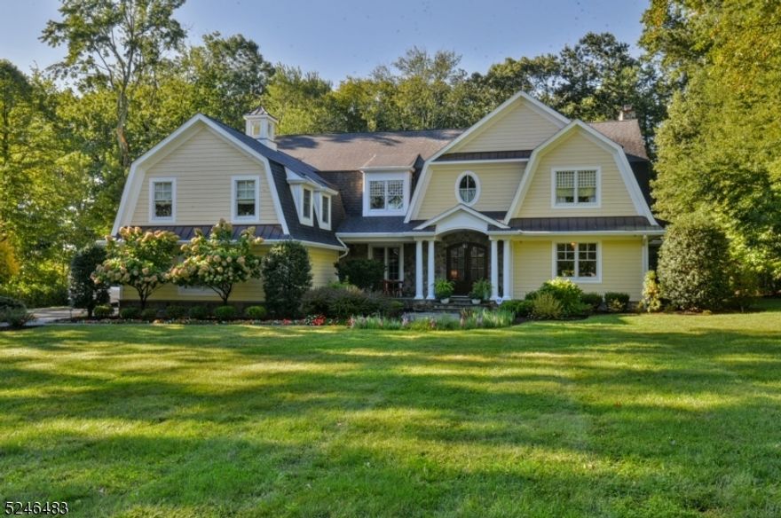 Spectacular Home in Wyckoff w/the utmost attention to detail. This is the home that has it all. Situated in Sicomac on over 1.1 acres, this young home is perfection with an amazing layout, high-end products and workmanship throughout. The grand Foyer w/raised panels and curved staircase sets the stage for this beauty including the banquet sized dining room, luxurious Living Room, custom bar + inviting family room that opens to the Gourmet High-end Kitchen and includes a Pantry and a one-of-a-kind Butler's Pantry. There are 2 half baths and custom mudroom, a back staircase all leading to a fabulous covered carport. 2nd Floor has a deluxe Primary suite w/the gas FPL, Marble bathroom + custom closets, 2 BRs with the J&J Bath, another BR and an additional private guest suite for company. The park-like backyard is lush, flat and private and has a great covered side patio + bkyd patio,too. Full house generator, security, heated garage. Too much to list! Add'l features list available.