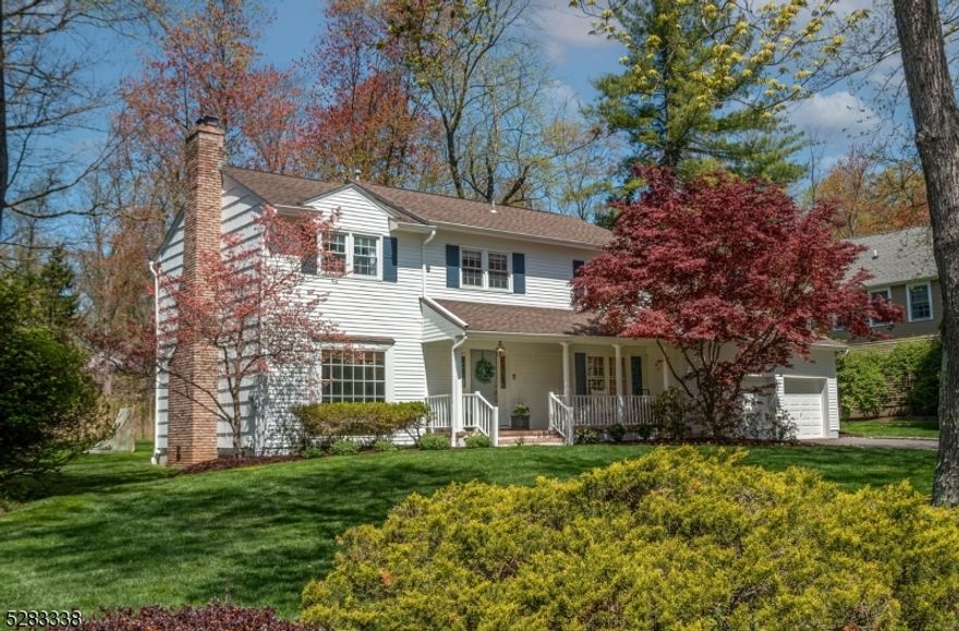 Feel like you are stepping into the pages of a magazine when you see this picture-perfect home! The impeccable attention to detail is apparent in every inch of this bright and open 4 bed colonial. Exterior and interior recently painted for today's sophisticated eye. The floor plan is well thought out with gracious open living and easy access to the entertaining deck and beautifully manicured flat backyard on over half an acre! Refinished hardwood floors and new light fixtures throughout. Updated kitchen features a pleasing blend of white marble on the center island & black granite countertops with subway tile backsplash. Large dining area and bar with wine refrigerator are perfect for your entertaining needs. The kitchen opens to an expansive family room flanked by windows and a beautiful gas fireplace adding character and warmth. Sunny living room boasts a 2nd fireplace that is wood burning and offers additional space to relax and enjoy friends. An updated laundry room/mudroom with gorgeous herringbone flooring is conveniently located off the kitchen and offers access to both the garage and outdoor deck. The 2nd floor hosts all 4 bedrooms including a primary suite with deluxe bath, jetted tub & oversized shower. A walk-in closet & office complete this tranquil space. 3 bedrooms share updated bath with double vanity. 2 bedrooms showcase custom built-ins that offer visual appeal and functionality. Basement offers sizeable rec area with adjacent craft area with newer cabinets.