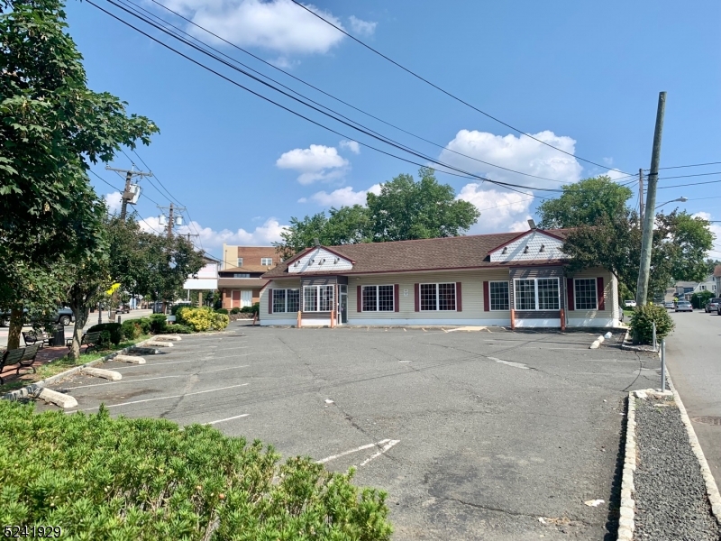 High visibility corner retail location with a private parking lot in downtown Maplewood! The property is set up with 2 entrances so there could be multiple businesses in 1 location. The existing space has a kitchen in the back of the building with a walk-in box, previous tenants were Dunkin Donuts & Blimpie. There is a door for loading on the left side of the building. Perfect for restaurants, retail, office and even cannabis is a permitted use. Bus stop located directly outside of the building