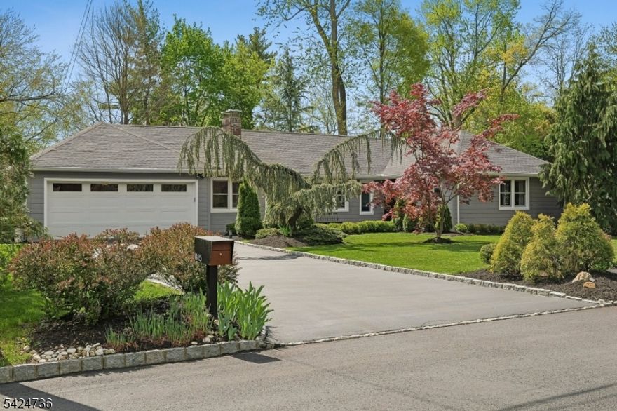 Welcome to elevated Ranch living, masterfully designed for entertaining. This meticulously maintained 3 bedroom, 1.5 bath home blends timeless style with modern comfort, offering a bright, open-concept layout ideal for both everyday living and effortless hosting. The inviting living room, complete with a cozy fireplace, flows seamlessly into the dining room complete with a floating wall-mounted cabinet and beautifully updated Kitchen featuring quartz countertops, a center island, custom windows, and high-end stainless steel appliances including Wolf and Bosch. Sliders provide direct access from the kitchen to a covered deck, creating the perfect indoor-outdoor flow for year-round entertaining. Just off the living room, a versatile office/playroom offers flexible space for remote work, hobbies, or additional living needs. The fully finished basement adds valuable living space with a dedicated laundry room and abundant storage. This home offers too many upgrades to list, including a new roof, siding, gutters, driveway, and more ensuring peace of mind for years to come along with central air, forced hot air heating, a sprinkler system, French drain, and sump pump. Outside, enjoy lush landscaping and a spacious deck, perfect for entertaining or relaxing in your own private retreat, while a 2-car garage completes this exceptional, move-in ready home that truly blends sophistication, comfort, and functionality.   You don't want to miss this stunning home !