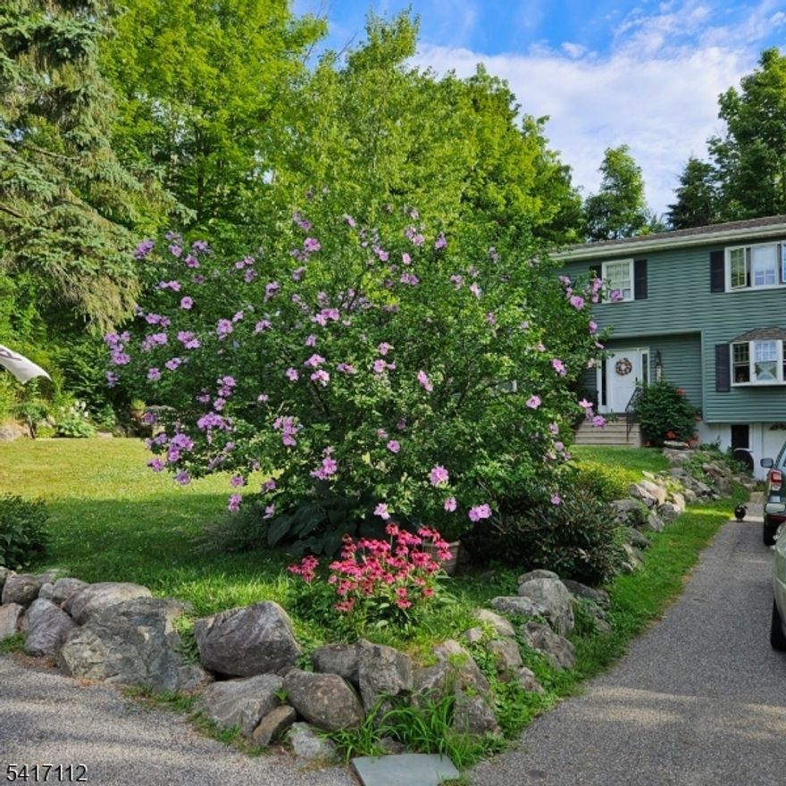 Enjoy the feel of lake living in this lovely home. Ideally situated near the lake, beach, and ball field, this property offers the perfect setting for relaxation, recreation, and year-round enjoyment. The main level features a spacious eat-in kitchen with beautiful cabinetry, ceramic tile backsplash, and a charming dining area with lovely lake views. A bright family room also captures scenic lake views, while a comfortable living room and convenient half bath complete the first floor. Hardwood floors run throughout the main level, adding warmth and character. Upstairs, the primary bedroom offers a walk-in closet, tranquil lake views, and a private full bath with a jetted tub. The second floor also includes a second full bathroom, laundry area, dedicated office space, a second bedroom, and a versatile den currently used as a third bedroom. Additional highlights include a bright interior, ductwork in place for central air, recessed lighting, new driveway, paver walkway and patio, new water heater (2026) and newer well equipment. The basement, with access off the driveway, provides excellent storage space.With the lake just moments away and nearby access to the beach and recreational fields, this home offers the perfect blend of comfort, convenience, and year-round outdoor enjoyment. Don't miss this wonderful opportunity to enjoy lake-style living!