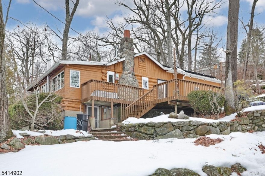 This beautifully maintained 2-bedroom, 1.5-bath home offers the perfect blend of rustic character and modern comfort. Natural wood, sunlight pouring through the windows, and peaceful lake views create a warm and calming atmosphere from the moment you walk in. The home has been tastefully decorated, blending classic cabin character with practical updates like energy-saving solar panels(owned) and water filtration system. There is a fireplace on the main level as well as a wood burning stove in the basement. The full bathroom has access from the primary as well as the hallway, 2nd bedroom includes a half bath. Outside you will find a private driveway, artist's shed/workspace, and quiet spots to enjoy morning coffee while taking in the surrounding nature. Whether you're looking for a full-time home, weekend escape, or creative retreat, this Erskine Lake (membership optional) cabin offers a rare mix of charm, light, and lake community living.