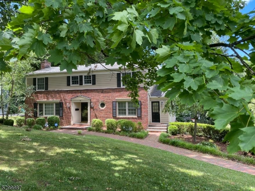 Welcome to this redefined custom colonial in the sought-after Franklin School District of Summit.  The Caplan-built home in Rolling Hills was expanded in 2007 to include a large family room and spacious renovated kitchen.  This beautiful 4 bedroom, 3.1 bath colonial is on a 0.32-acre lot. Discover the inviting living room with a wood-burning fireplace and French doors leading to the sunroom and the family room.  The flow of the home is just perfect. You can entertain with ease, with each room seamlessly flowing into each other.  The home boasts a gourmet eat-in kitchen with a center island, featuring top-of-the-line appliances, including a wall oven, microwave, warming drawer, vented hood, and a wet bar with wine cooler. There is wonderful indoor/outdoor access through two sets of French doors leading to the deck, and a door for mudroom access.   Upstairs, retreat to four bedrooms and three full baths, inclusive of a spacious primary suite with a walk-in closet and luxurious bathroom with a beautiful soaking tub and separate stall shower. The lower level offers a versatile recreation room, access to a convenient 2-car garage, built-in closets for storage, and a huge cedar closet.  Situated in the highly desirable town of Summit, NJ, enjoy the best of both worlds with the tranquility of the nearby Watchung Reservation and access to the bustling downtown. Minutes to the Summit train station with direct trains to NYC and Hoboken.