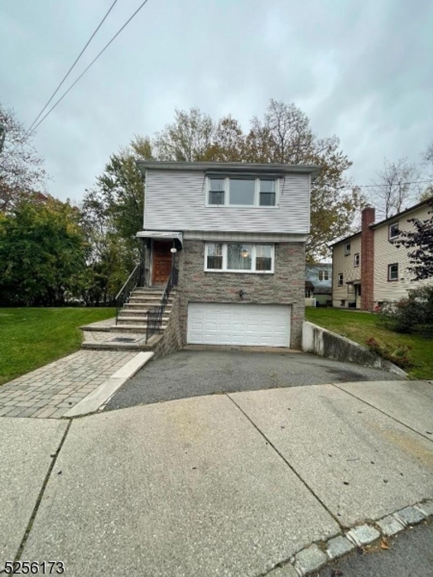 Fantastic rental opportunity! Spacious and sunny first floor apartment ready for occupancy. Nicely maintained, this unit has great space and flow. Large eat in Kitchen with lots of white cabinets, SS cooktop, dishwasher and wall oven. Open passthrough to deep combo Dining Room and Living Room. 3 good sized Bedrooms with ceiling fans and Full Bath. Ground floor Recreation Room/Office, additional Full Bath and Summer Kitchen. Gleaming hardwood floors throughout. Baseboard heating. Laundry on ground floor shared with upstairs tenant. One garage parking and one parking spot in driveway. Shared use of rear yard. Jitney to Maplewood Train Station .03 miles. Close to shopping, dining and parks.