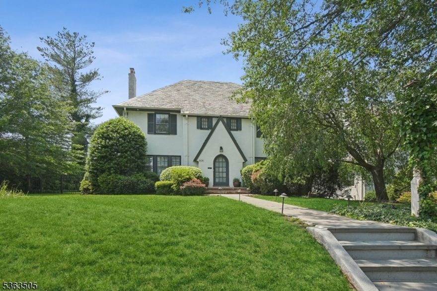 CITY VIBE, SUBURBAN SOUL - YOUR MONTCLAIR DREAM STARTS HERE!  If you've been dreaming about more space, style, & serenity without giving up the culture, community, & cafe life you love - THIS IS IT!  THIS BEAUTIFULLY RENOVATED UPPER MONTCLAIR 1929 COLONIAL is located just 1/2 mile to NYC/HOBOKEN train, nearby bus service & less than a mile from Upper Montclair Village coffee shops, restaurants, workout studios & indie stores; offering everything city dwellers crave in a more relaxed, leafy setting!  Enjoy Montclair's top-rated schools, parks, & vibrant art scene.  INSIDE, THE PREFECT BLEND OF CHARM & MODERN CONVENIENCE -  RICH WOOD FLRS, FRENCH DOORS, 2 FPLS.  The spacious LR flows into a CHIC HOME OFFICE w/garden view.  At the heart of the home, THE OPEN-CONCEPT DESIGNER KITCHEN & SHOWSTOPPER FAMILY RM IS SURE TO BE YOUR #1 GATHERING SPOT! THE KITCHEN STUNS w/ top Thermador appliances, custom inset cabinets, large center island & opens to a FABULOUS FAMILY RM w/ skylit volume ceiling, exposed beams, fpl & French doors to a newer bluestone patio & idyllic yard.  A sweet powder rm & NEW MUST-HAVE MUDROOM will not disappoint!  2nd flr boasts 3 SPACIOUS BRS including a FABULOUS PRIMARY w/ OUTFITTED WIC, GORGEOUS BUILT-IN,  & SUMPTUOUS MARBLE BTH.  The 3rd level offers stunning newer BTH, 4th BR, & newer laundry rm.   THE NEWER RENOVATED LOWER LEVEL boasts a beautiful BTH, arts & crafts area, recreation, exercise & leisure rms, workshop & outside exit. Driveway access on Glenwood