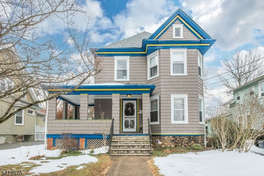 On today's episode of "This Old House" This character-filled residence is brimming with architectural charm   from the stained glass window and hardwood floors to the rich moldings and thoughtful details you simply can't replicate. A welcoming wrap around front porch sets the tone, leading into a welcoming foyer and light-filled living room and a spacious dining room designed for gatherings that linger. 1st floor full bath offers convenience for guests, while the large eat-in kitchen delivers generous cabinetry, prep space and a pantry area with built-ins opening seamlessly to a rear family room addition! Upstairs you will find 5 nicely sized bedrooms. The Primary Bedroom has its own Full Bathroom! Convenient laundry room with access to walk up attic. Outside, a large deck overlooks a deep rear yard & a detached 2 car garage completes the package. Located in Lincoln School District & just a short walk from the hustle and bustle of the "Ave," Caldwell's famous & vibrant downtown with the best restaurants and pubs!