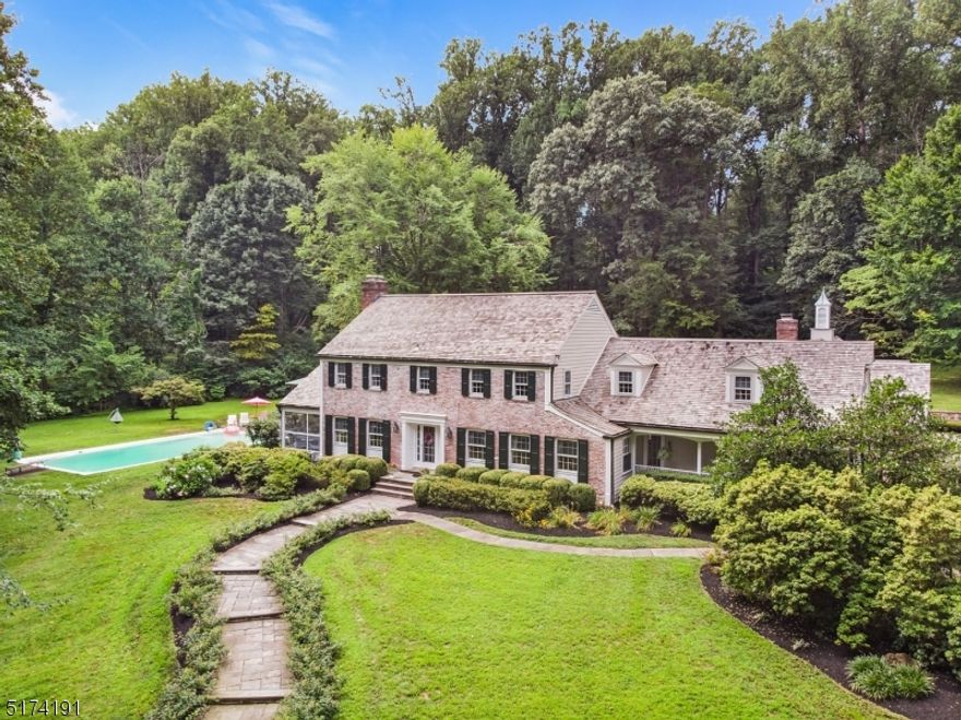 A SLICE OF HEAVEN JUST WAITING FOR YOU!  Fabulous 4 bedroom, 5.2 bath colonial on completely private 4+ acre lot on quiet cul-de-sac is waiting for you.  Highlights of the home include gorgeous white kitchen with huge center island, architectural moldings and detailing throughout, beautiful screened-in porch overlooking the pool, oversized bluestone patio running the entire back of the house, koi pond with water feature, pool house with full bath, luxury primary suite with sitting area, dressing area, walk-in closet, spa-like bath with steam shower & jetted tub, large office with private entrance, hi-efficiency furnace, new septic, whole house generator & 5 car garage.  Wonderful flow both indoor & out for entertaining & large gatherings.  Truly something for everyone in an amazing tranquil setting.