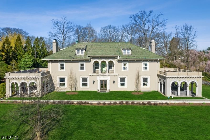 A true yellow brick road leads you to this incredible Mediterranean-inspired villa set on well over one acre of property in a private Montclair enclave offering sunset views. Exquisite period details and stunning custom millwork blend seamlessly with modern amenities in this one-of-kind estate-quality property. Spacious rooms offer casually elegant living spaces for entertaining in style or relaxing in comfort. The modern chef's Kitchen offers professional-grade appliances by Thermador, poured concrete counters, Shaw ceramic farm sink and ample room for dining.  The nearby pantry and mudroom offer practical storage solutions and the scullery with glass front built-ins, cast-iron sink and original warming shelf will delight. A banquet-sized dining room features a fireplace, leaded-glass built-ins, modern light fixture and spirits closet, plus double French doors to the south loggia for graceful entertaining. The geometric foyer with rich woodwork, leaded glass windows and turned staircase offers wide openings to additional formal and private living spaces. The upper levels offer spacious bedrooms and updated full baths, including the primary suite with large bedroom with fireplace, walk-in closet/dressing room, en-suite bath with double sinks, custom shower, soaking tub and WC with bidet, plus exercise room and private study. Outside find sprawling landscaped grounds with mature trees and perennial plantings and two loggias ideal for gatherings and enjoying the outdoors.