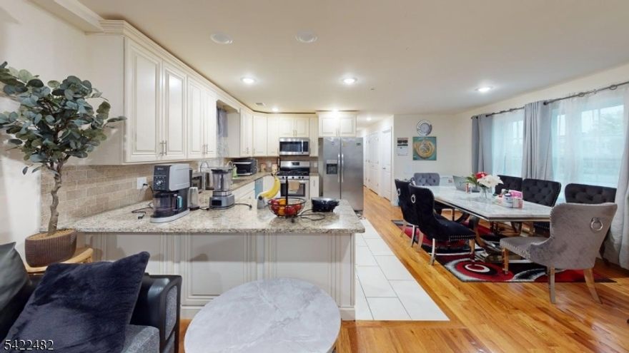 Built in 2023, this spacious and modern 2-family home offers an exceptional opportunity for both owner-occupants andinvestors. With approximately 3,933 sq ft of living space, this well-designed property features two 3-bedroom units with openand functional layouts, generous room sizes, and contemporary finishes throughout. The larger unit offers 2.5 baths plus afinished recreational room with a private entrance, providing flexible additional space. The second unit includes 2 full bathsand a comfortable, versatile floor plan.Additional highlights include a built-in 2-car garage, central air, hardwood and ceramic tile flooring, separate living and diningareas, and separate utilities for added convenience. The property also benefits from a tax abatement, adding even morelong-term value. Whether you're looking to live in one unit and offset your mortgage with rental income, or add a strongmulti-family property to your portfolio, this home offers excellent flexibility and appeal.Ideally located near major transportation, shopping, schools, and local amenities, this property combines modern constructionwith income-producing potential. A rare opportunity to own a recently built multi-family home with strong appeal for both endusers and investors.