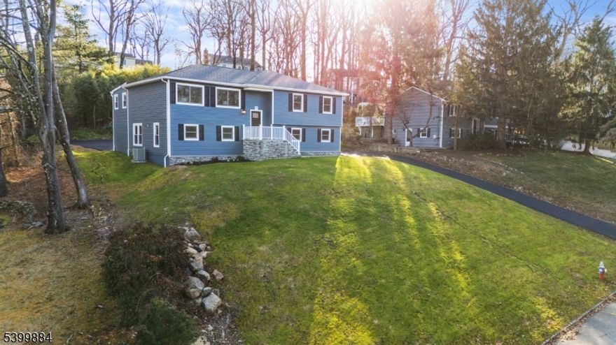 Stately, Fully Updated, Oversized Bi-Level in Sought-After Burnham Park! Perched high atop a hill, this beautiful, fully renovated home offers modern living at its finest w/ an open floor plan, sun-filled spaces, & designer finishes. The stunning white kitchen steals the show w/ an expansive island, sleek countertops, & stainless appliances, perfect for everyday living & effortless entertaining. Generous sized bedrooms, 3 brand-new baths, & a flexible upper and lower level create incredible versatility, including fantastic potential for home office and/or extended-use living. The lower-level features 2 large rooms, a full bath, a laundry room, a separate entrance to the rear yard, & direct access from the garage, making the space exceptionally functional for a wide range of lifestyles. The rear blacktop area offers even more versatility, ideal for use as a sports court or additional parking, the seller will also consider converting it to a grassy yard for buyers who prefer more green space. The attention to detail is unmatched in this stunning home! In addition to the kitchen & bath renovations, other updates include: windows, doors, 3 garage doors, siding, roof, HVAC, tankless HWH, LED lighting, electric, plumbing, flooring, front steps, driveway, walkways, & landscaping, a truly a top-to-bottom, inside-out transformation. All of this in a prime Burnham Park location, close to town yet tucked away for peace & a true neighborhood feel. A turnkey gem you won't want to miss!