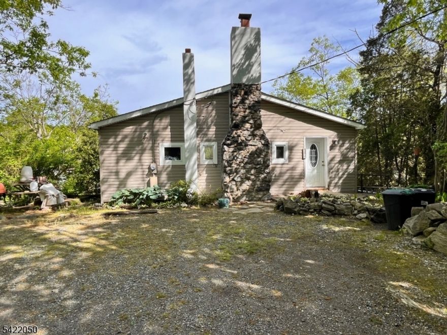 What a view! Boating and Fishing right from your own dock from this cozy lakefront 2-bedroom, 1.5-bath rental in Cranberry Lake, NJ! This property offers a unique opportunity for those seeking a tranquil retreat, with stunning panoramic views of private Laurel Cove in Cranberry Lake. Large LR/DR area with Kitchen and full bath, 2nd smaller bedroom or office space all on 2nd floor with gorgeous lake views, 1st floor primary bedroom with lake views, laundry hook-ups, two docks with elevated deck, power boats up to 35 mph, Credit Score 620 or higher, renters insur, 1.5 security deposit, 1st month rent. Fireplace is ornamental only. Avail May 1st. Tenant responsible for snow removal, grass mowing and garbage to bottom of driveway. Located off Route 206/80 near major shopping and restaurants. Just move in and fish, swim, boat and relax all year round.