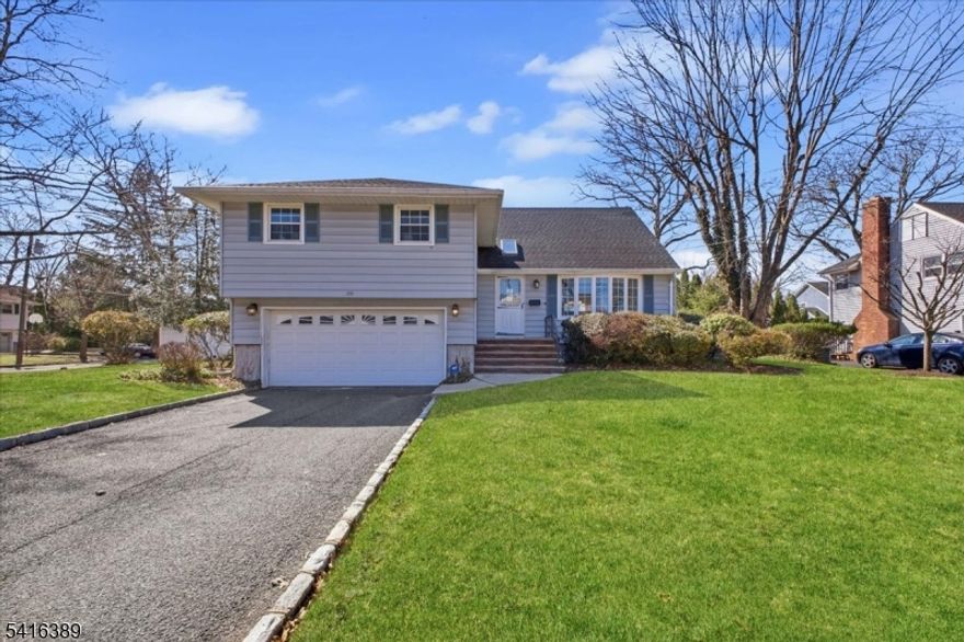 Tucked away on a quiet street just a short walk to Jefferson School, this spacious 4-bedroom, 2.1 bath home offers comfort, style, and flexibility across multiple levels. The main level features a bright, open floor plan. Beautiful hardwood floors flow throughout the living areas, while large picture windows at the front and back fill the space w/ natural light. The expanded eat-in kitchen features wood cabinetry, granite countertops, ss appliances including a Viking stove, double wall ovens, a breakfast bar, and a sunny bay window dining area. A sliding glass doors lead to the patio for easy outdoor dining & entertaining. Upstairs on the 2nd level are 3 bedrooms, including a generously sized primary suite w/ ensuite bathroom & two closets. Two additional bedrooms share the hall bath, & a convenient second laundry area is located on this level. The 3rd floor offers a private 4th bedroom ideal for guests, a home office, or creative space.The ground level features a family room with a wood-burning fireplace, along with a powder room. The home continues to the lower level with space for recreation, storage, and a laundry room. Step outside to your private retreat. The backyard features a heated in-ground pool surrounded by mature landscaping, creating a peaceful setting for relaxing or entertaining. A whole-house generator provides added peace of mind year-round. This home combines a desirable location, generous living space, and thoughtful amenities inside and out.