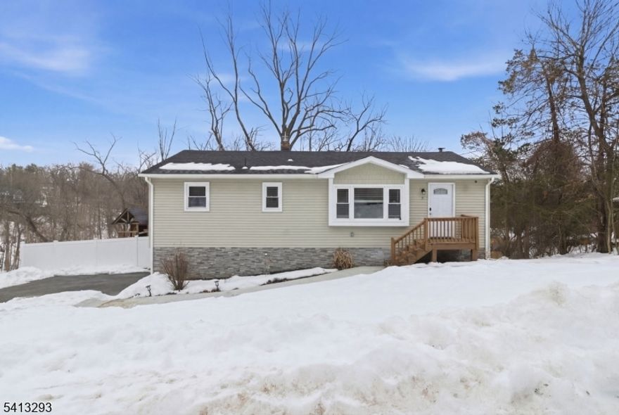 Move right into this beautifully updated ranch set in the desirable Glenwood section of Vernon. Renovated in 2019, this home features hardwood flooring throughout and a modern kitchen with granite countertops, subway tile backsplash, and a functional layout that flows seamlessly into the main living space. Sliders lead to a newer deck overlooking a fully fenced backyard with a custom patio and built-in firepit   perfect for entertaining or relaxing outdoors. The property backs directly to the Appalachian Trail, making it ideal for hiking and enjoying nature right from your own backyard. A full finished walk-out basement provides excellent additional living space for a family room, home office, gym, or guest area. An attached garage adds convenience and the overall layout offers comfortable one-floor living with bonus space below. Located close to Route 94 and just minutes to Warwick's wineries, restaurants, and downtown, this home offers the perfect balance of updates, lifestyle, and location. Truly a must see.