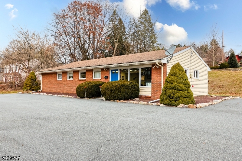 FREESTANDING COMMERCIAL PROPERTY AVAILABLE FOR SALE ON A CORNER LOT IN CLINTON, NJ CONVENIENTLY LOCATED OFF OF EXIT 15/RT. 78 AND CLOSE TO DOWNTOWN. CURRENTLY USED AND FITTED AS A HAIR SALON/BARBER SHOP FOR MULTIPLE DECADES, THE PROPERTY HAS BEEN WELL MAINTAINED OVER THE YEARS AND FEATURES ONE LEVEL WITH 1,464 SF, PARKING FOR 9-10 VEHICLES INCLUDING ONE DESIGNATED HANDICAP SPOT, 2 POINTS OF INGRESS, 9' WIDE FRONT DISPLAY WINDOWS, FRONT DESK/RECEPTION AND LOBBY, 3 SERVICE CHAIRS AND STATIONS WITH PLUMBING/SINKS, BREAK ROOM AND ADDITIONAL 15' X 11' ROOM FOR ANCILLARY SERVICES. ZONED OB-1 (OFFICE BUSINESS DISTRICT), PERMITTED USES INCLUDE BUSINESS, PROFESSIONAL AND ADMINISTRATIVE , MEDICAL OFFICES, NURSERY SCHOOLS AND CHILD-CARE CENTERS, STUDIO FOR ARTS, DANCING, MUSIC, LANGUAGE AND PHOTOGRAPHY, ASSISTED LIVING AND RESIDENTIAL HEALTH CARE FACILITIES. REAL ESTATE CAN BE SOLD ALONG WITH SALON EQUIPMENT AND FIXTURES.