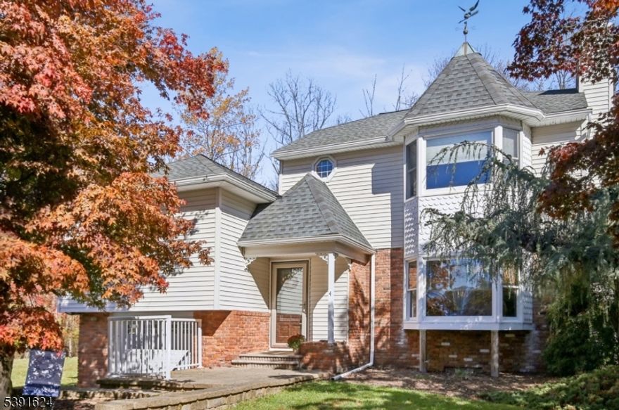 WELCOME HOME AND WELCOME TO THE BEAUTIFUL TOWN OF KINNELON...AND TO THIS FAYSON LAKES BEAUTY! Feel like you're on vacation every day, because that's what it will feel like in Fayson Lakes!  This one of a kind split level home in gorgeous Fayson Lakes boasts 3 bedrooms, 3 full baths, with a HUGE primary suite and enormous walk in closet! Large kitchen with granite countertops, cherry cabinets, hardwood floors throughout, an unbelievable living room, separate dining room, 2 fireplaces, full finished basement, perfect for a recreation room or office. Now let's talk about the outside...a large, wraparound deck, lush landscaping, and huge double yard space. This wonderful community offers sandy beaches, a clubhouse, tennis, volleyball, swim teams and the best neighbors you could ask for!!! Your search is over. Get ready to unpack. Kinnelon boasts a top rated school system, is close to transportation, shopping and golf courses. Truly a special place, come see all that this home and this community have to offer. Hurry though, because this one won't last long.