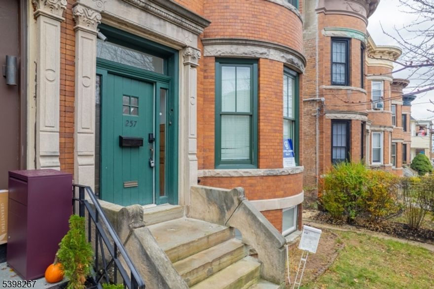 Stunning 5-Bedroom Brownstone with Finished Basement in Prime Jersey City Location.  Welcome to this beautifully maintained home offering the perfect blend of historic charm and modern comfort. Nestled on a tree-lined street in the heart of Jersey City, this spacious home is ideal for those seeking extra room to live, work and entertain.Step inside to find sun-drenched living spaces, high ceilings, and original architectural details that capture the timeless character of brownstone living. The main floor features a generous living and dining area, a modern kitchen with stainless steel appliances, and ample storage throughout.  This home features a main floor bedroom/work area that is convieniently located by the front door.  Upstairs, you'll find 4 large large bedrooms and 2 full baths, providing plenty of flexibility.The fully finished basement includes two additional rooms and a full bath perfect for a gym, media room, guest suite, or home office along with extra space for storage or recreation.Outside, enjoy a private backyard ideal for entertaining or relaxing, plus convenient access to parks, shops, cafes, and transportation to Manhattan.