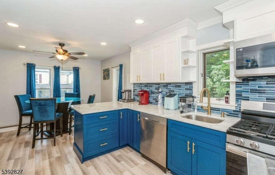 Amazing opportunity in the up-and-coming town of Sussex Borough, New Jersey! This beautiful single-family colonial features a FULLY RENOVATED interior that was completed in 2022. Featuring a FULLY CUSTOM kitchen AND Bathroom! The Kitchen is a work of art with stainless steel appliances, trendy blue and white cabinetry perfectly complemented with grey flooring and a marbled quartz countertop! The custom designed bathroom features a hybrid Jet-Rainfall shower system with receded lighting in the shower ceiling! ALL electric and plumbing are BRAND NEW! Freshly painted with brand new carpeting just installed on the staircase in July! Conveniently located within walking distance to plenty of necessities like Shoprite and the up-and-coming downtown of Sussex Borough which features plenty of small businesses to explore as well as many dining options. Commuting is simple with easy access to Route 23! Sussex Borough is becoming a gem in Sussex County, so DON'T miss out on the chance to make this beautiful custom home YOURS!!!