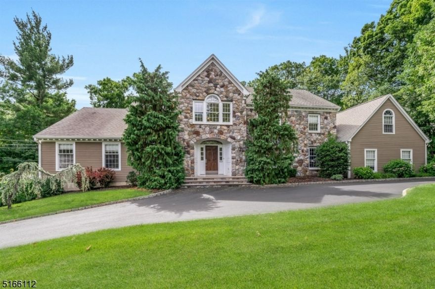 Cool, calm & sophisticated, this home is enveloped in light & comfort. Neutral walls, rich wood floors & high ceilings create a timeless style. Imagine entertaining in this gorgeous gourmet kitchen w/massive island or the adjacent stylish formal DR. Step into the comfortable Great room w/stone fireplace & access to multiple decks. The living room is a great place to cozy up by the fire or shoot pool. Immerse yourself in the spacious 1st floor Primary ensuite w/sitting room, WICs & luxurious bathroom. The 2nd floor is spacious with so much flexible space 2 ensuite BRs, BR, Full hall bath, Office/BR & large bonus room. The impressive lower level features a family room w/fplc, office, Gym, BR, full bath, cedar closet & storage. Step thru the sliders which open onto a gorgeous patio, fabulous heated pool & beautifully manicured private green space. Circular driveway & full house generator as well!. This house truly has it all nestled in an idyllic setting!