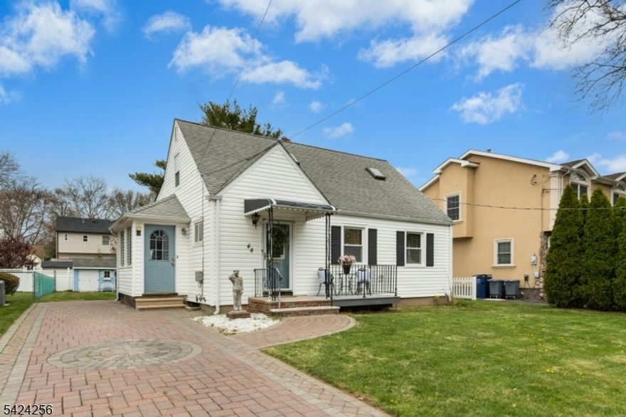 Charming Cape Cod-style home offering comfort, space, and great potential. The bright living room is perfect for entertaining and flows seamlessly into a spacious, sun-filled kitchen featuring a center island and a generous dining area with large windows that invite abundant natural light. Two conveniently located first-floor bedrooms provide easy living, along with a full bathroom complete with a freestanding tub and separate stall shower.Upstairs, you'll find a large private bedroom or space for a home office. The basement is already framed and ready to be finished, offering excellent opportunity for additional living space.Outside, enjoy a decorative paver driveway and a generously sized, three-sided fenced yard. The backyard features a deck with an awning, perfect for relaxing or entertaining, as well as a storage shed for added convenience.Don't miss the opportunity to make this lovely home your own!