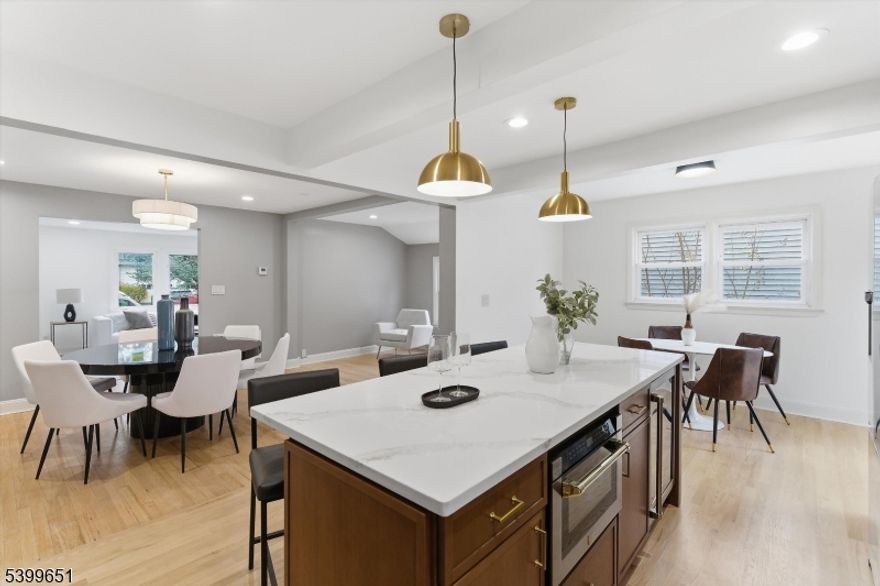 This stunning home is nestled in a quiet & serene neighborhood near the border of Livingston, NJ where deer abound! Its layout has been optimized for modern living with every nook & cranny put to great use! At the heart of this beauty is a chef's kitchen offering warm tones with gold accents, brand new stainless steel appliances & upgrades that include a high-end built in beverage fridge & microwave! Prepare to be blown away by the second floor which has been upgraded to a private sanctuary offering an impressive floor area, a large spa-inspired private bathroom with a double sink, soaking tub, stall shower with body sprays & an added skylight for your natural lighting needs, Two spacious WIC's & 2 additional closets! Further notable upgrades include a brand new roof, multi-zone HVAC system, fully replaced plumbing system & upgraded electrical! The partially finished walk-out basement expands your living space featuring multiple storage areas & direct outdoor access. Mt. Pleasant elementary & Liberty Middle School conveniently                  v within a half mile!