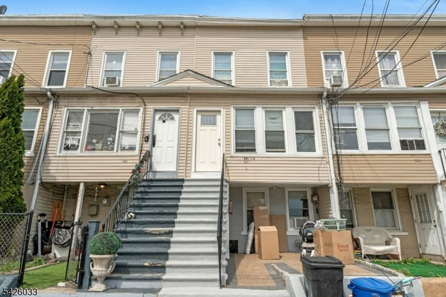 Well Kept Rowhome with Three Bedrooms and 1 bath. Front and back patio, Large Eat-In-Kitchen and Laundry Area.