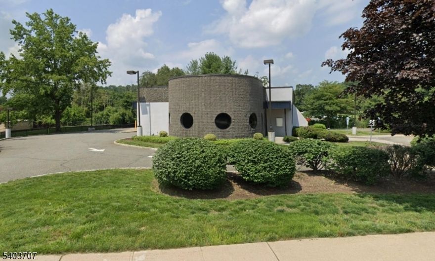 Situated just off Interstate 80 in a high-traffic retail corridor, this  2,838 SF freestanding commercial building offers a strong opportunity for investors, owner-users, or future redevelopment. Formerly a bank branch, the property sits on a 1.05-acre lot with approximately 40 on-site parking spaces and an impressive 448 feet of frontage along Howard Boulevard, providing excellent visibility and accessibility. The one-story, Class B building is currently vacant and lends itself well to single or multi-tenant use. Zoned B-1 (Business) in the Borough of Mount Arlington, permitted uses include retail, professional, and service establishments. The property is surrounded by heavy retail activity and is located directly next to two hotels, making it a highly desirable location for a wide range of commercial users in a well-established market.