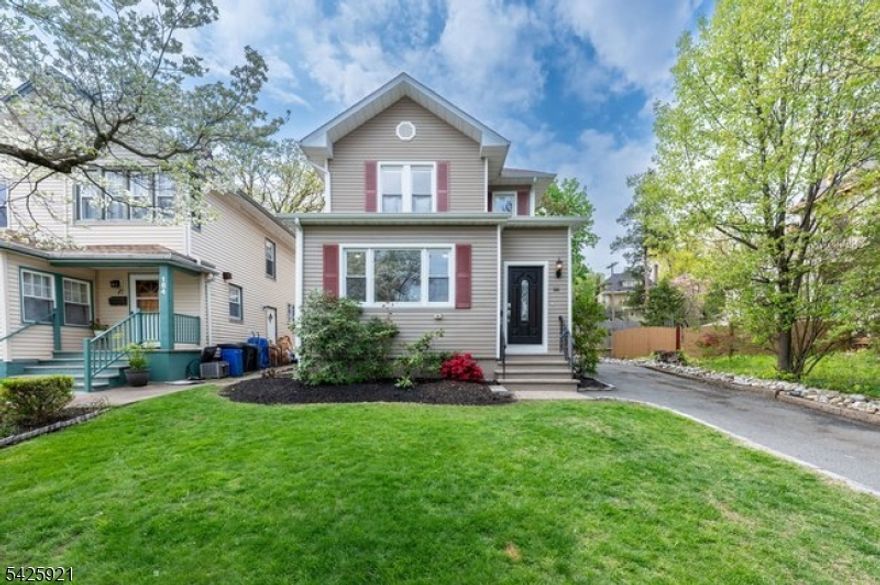 Step into a space where classic Colonial charm meets easy, modern living and instantly feel right at home. From the moment you enter the welcoming vestibule and mudroom, this beautifully maintained 3-bedroom, 1.1-bath Colonial sets the tone with warmth and character. High ceilings, hardwood floors, and an abundance of natural light create a bright, airy feel throughout. The living room is comfortable and inviting, while the sun-filled dining room-framed by oversized windows-is perfect for everything from casual dinners to lively gatherings. French doors lead to a bright home office, offering a quiet space to work, create, or simply recharge. The updated kitchen blends style and function with stainless steel appliances, recessed lighting, and a layout that just works for everyday life. A convenient powder room completes the main level. Upstairs, you'll find three generously sized bedrooms with great light, comfortable ceiling height, and ample storage. The full bath features timeless subway tile and a relaxing jetted tub-your own little retreat at the end of the day. The finished basement adds even more flexibility with space for recreation, hobbies, laundry, and storage. Outside, the large backyard invites play, entertaining, or simply enjoying a beautiful day at home. All of this just moments from Edgemont Park, near the middle school, and perfectly located for an easy New York City commute. Bonus: rare 2-family zoning offers flexibility and future potential.