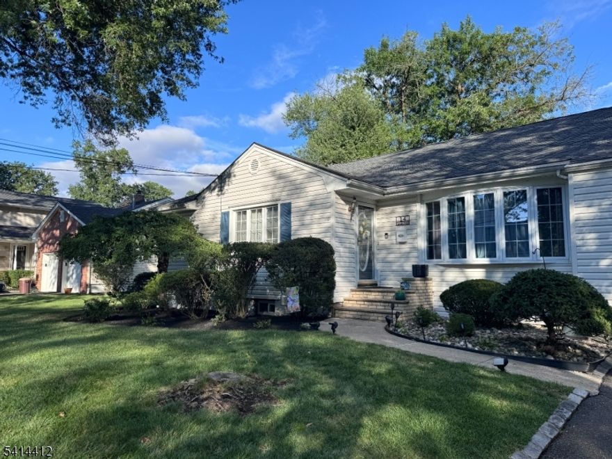 Gracefully positioned on a quiet circular street, this classic split level residence offers privacy, timeless design, and a sense of neighborhood charm rarely found. Lovingly maintained by its second owner for the past 28 years, the home reflects thoughtful stewardship and enduring quality.Inside, the living room is defined by a dramatic two story ceiling and gas fireplace, creating a striking focal point for both everyday living and entertaining. The formal dining room, highlighted by a generous bay window and extensive pantry storage, flows seamlessly into the kitchen appointed with solid wood cabinetry and breakfast bar seating.The upper level includes three bedrooms, highlighted by a primary suite with private bath and generous closet space. The ground level offers a comfortable family room, fourth bedroom or office, laundry room, powder room, and direct access to the attached garage and backyard.Outdoors, the property features a deck overlooking the fully fenced yard, mature landscaping, and an underground sprinkler system on a level 91 x 110 lot. Recent updates include high efficiency heating and central air installed in 2021 and a roof replaced in 2019.Set along a peaceful circular street in Westfield, this residence combines classic architecture, careful ownership, and an exceptional neighborhood setting.