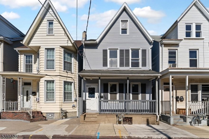 Beautifully renovated 3-bedroom, 1-bath Colonial featuring numerous updates! This home offers a new roof, vinyl siding, and windows, along with a new gas hot water heater and updated electrical and plumbing systems for peace of mind. Enjoy new LVP flooring throughout, a freshly painted interior, and a finished attic space with heat vents. The main level includes a spacious front bonus room or home office, living room, formal dining room, and an eat-in kitchen. Additional highlights include forced hot air heat, off-street parking accessible from the back alley, and a basement freshly painted with laundry hookup and walk-out Bilco doors. Relax on the private side porch. The home has a clear certificate from the township. Conveniently located near local shops, dining, and amenities. This move-in ready home offers comfort, style, and value!