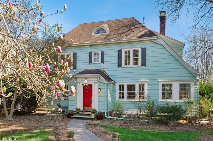In the heart of everything location - Upper Montclair Village, NYC train, shops, cafes, restaurants, cinema, sports fields, public pool, and Mills Reservation for woodland hikes with views of the Manhattan skyline, this beautiful home blends classic charm with modern updates, and a certified native wildlife habitat garden filled with flowering plants.Perfect for entertaining, the spacious kitchen/great room with cathedral ceilings and skylights, opens onto a wrap-around rear porch and steps down to a patio fire-pit area. Both the formal dining room and formal living room are flanked by two sunrooms, one with a second fireplace. A convenient powder room is situated off the center hall.The second floor offers a spacious and private primary suite, complete with a dressing room with skylights, and an ensuite with cathedral ceilings, heated floors, a Kohler Ceric freestanding bath, large shower, two gorgeous sink vanities, and a smart toilet.The additional  two matching bedrooms on this floor feature nook desks, and walk in closets.The second full bathroom on this floor has heated floors, a soak bath and rain shower, and a smart toilet.The third floor features 2 bedrooms and a full bath,.storage closets, a powder room, and an entertainment area.This home offers the perfect combination of elegance, functionality, and convenience.