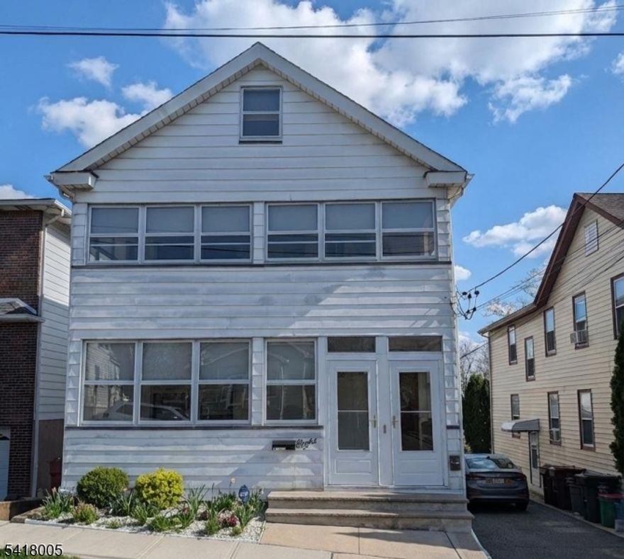 Discover a rare and lucrative investment opportunity at 8 Witherspoon St in Nutley. This exceptional three-family home offers immediate income-generating potential for savvy investors or owner-occupants. The property features three distinct living spaces: The basement unit offers a comfortable one-bedroom, one-bathroom finished space. The first floor offers a move-in ready unit, a recently updated unit offering two bedrooms, one bathroom, a living room, and a formal dining room. The 2nd floor is also a move-in-ready unit featuring two bedrooms, one bathroom, a living room, a dining room, and stunning hardwood floors. (Note: Furniture in the second-floor photos has been digitally removed to protect tenant privacy.)Both the first and second-floor units will be delivered vacant, giving you the immediate flexibility to move in or lease them out at market rental rates. Outside, the property continues to impress with a massive driveway offering parking for five or more vehicles, a detached two-car garage, and a beautifully expansive backyard. Registration Note: This property is legally registered as a three-family home with the township of Nutley. Should the new owner wish to register the property at the state level, it will be their sole responsibility to complete that process. Don't miss out on this fantastic multi-family asset. Highest and Best Wednesday 4/29