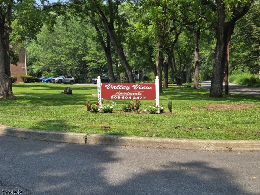 Fantastic, freshly painted, and new carpeting.!  Open concept, light, bright sunfilled!  Large bedroom with 2 double closets. Outstanding location with a rural peaceful setting!  Beautiful grounds, surrounded by woods, Lock St Park, even a trout stocked stream, walking paths and park benches!  Plenty of parking!  Minutes to shopping, dining, medical facilities, Rt 22 and 78.  Heat, water, sewer, and garbage included.  Landlord clears the snow, mows the grass and maintains the building.  Perfect!  Just move in and enjoy.  Dogs not allowed.