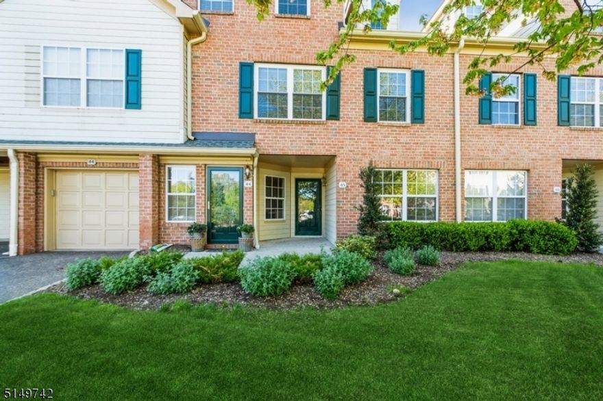 Move-In ready, spacious luxury Townhome with lovely outdoor deck space! This 2 bedroom, 2 bathroom home represents a unique opportunity to own a ranch style model in the desirable Moore Estate community.  Just steps away to the Loantaka Brook Preservation with walking/bike paths through the woods and near the pond.  No steps front entry as well as direct access from garage to the laundry room and kitchen. The main floor features a large and bright dining room and living room with a fireplace and wood floors with convenient sliding glass doors to the covered deck.  Spacious primary bedroom suite with a walk-in closet and private bathroom with jetted tub and stall shower. One additional bedroom, main bathroom, spacious laundry room and kitchen with cozy breakfast area completes the main floor.  The lower level offers a huge fully finished space ideal for guests with two bonus rooms/offices, a family/recreation room and plenty of closets and storage space.   The amenities include clubhouse, exercise room, swimming pool and tennis courts. The association takes care of exterior, snow removal, and landscaping. Enjoy the fitness center, association pool in summer and wonderful community events all year. This home is ideal for a commuter, convenient to both Convent and Morristown train stations as well as to Routes 24 and 287.  It is close to parks, a premier medical center and a lively downtown shopping and dining district.