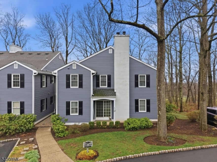 Tucked into the sought-after Basking Ridge section of Bernards Township, this inviting condominium offers a warm, comfortable lifestyle with a sense of privacy, surrounded by a peaceful wooded setting.  A welcoming entry hall features a built-in shoe rack and double coat closet for everyday convenience. The updated kitchen is both stylish and functional, offering granite countertops, newer cabinetry, tiled flooring, and an oven/range with a vented hood exhausting to the outside.  The bathroom has been tastefully updated with a pedestal sink, custom tiled flooring, and a tub/shower with a sliding glass enclosure.  The living room is centered around a charming wood-burning fireplace with glass enclosure, creating a cozy atmosphere, and opens through sliding glass doors to a private patio overlooking the woods. The spacious dining room is ideal for entertaining, and both the living room and dining room are enhanced with elegant crown molding.  A versatile multi-purpose room offers endless possibilities as an office, hobby, or entertainment space, complete with two walk-in closets and access to the laundry area.  Windows replaced in 2022 add to the home's efficiency and comfort.  Enjoy low-maintenance living in a tranquil, private setting with access to community amenities including a pickleball court, tennis courts, and an outdoor pool while remaining close to shopping, major highways and everything Basking Ridge has to offer.