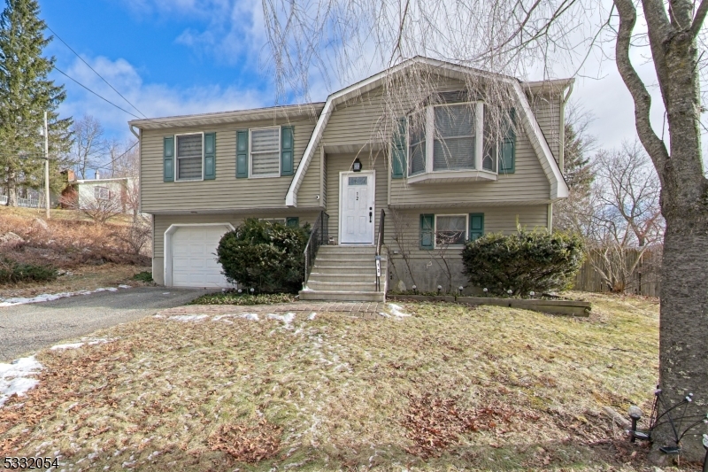 Recently updated bi-level home in the charming town of Vernon. The main level features a fully updated kitchen, bathroom, living room, and bedrooms, all enhanced with new vinyl plank flooring, fresh paint, modern appliances, and newer sliding doors leading to the deck. Additional upgrades include recessed lighting, updated fixtures, and a new front door. The lower level offers a cozy den, guest space, storage, laundry area, an updated half bath, and access to the garage, along with newer sliding doors opening to the yard. The deck was replaced in recent years. The main level also provides the potential for a third bedroom.