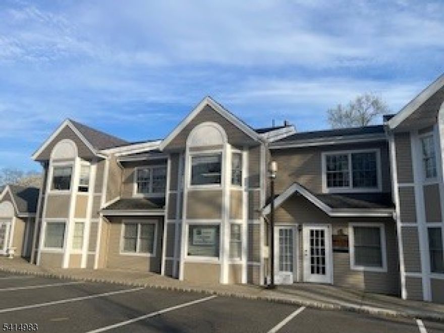 Spacious professional office consisting of 4 Offices, kitchen area, sitting area and large open area with ball pen desks.  Basement for storage.  LOCATION, LOCATION, LOCATION at corner of Mountain Blvd and Old Stirling Road traffic light.  Ample parking.  Unit is located on the second floor.  Walk up stairs from vestibule shared by four units. Warren Commons Condo Association takes care of the lawn, snow removal, garage and exterior maintenance.