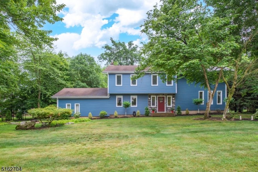 Beautifully updated Colonial in the heart of Shongum Lake! This home offers lots of space and a perfectly flat property, in one of the most coveted streets in Shongum Lake. The main floor offers an open layout perfect for entertaining with a Neutral Eat-in Kitchen with SS appliances and beautiful granite counter tops, open to the large Living Room and Dining Room. On the opposite end is a Large Family Room with Gas Fireplace and slider to deck. Updated Powder Room, and Laundry/Mud room. The second floor offers 4 well appointed bedrooms & newer baths. Master Bedroom with a Sitting Room, 2 large walk-in closets & Updated Master bath. The finished basement offers an Office, Large Rec Room and Storage space. The 3-Tier Deck overlooks the perfectly flat backyard. The whole property is flat with beautiful mature trees and lots of new landscaping as well. Upgrades include a Young Roof, Young SS Appliances, New Vinyl Siding, New HVAC system, Water Heater (2019), All New Landscaping, Recently Refinished Deck, Full House Generator HookUp. Public Utilities! The Shongum Lake community features a clubhouse, beach, boating, swimming, and a full calendar of social events. Begin living a resort like lifestyle today!