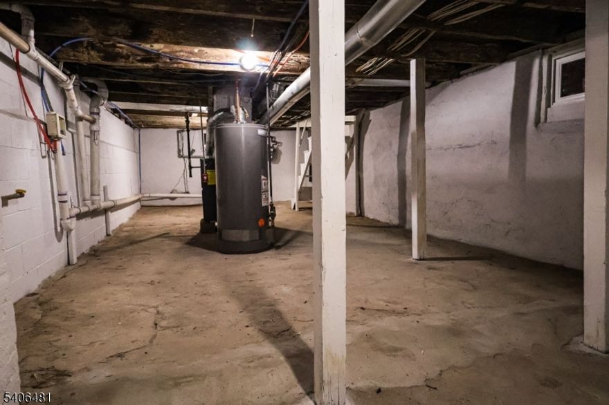 Introducing this newly renovated 4-bedroom 1-bath Cape Cod"style single-family home that features a modern kitchen with stainless steel appliances, granite countertops, and updated cabinetry.The brand-new hardwood floors throughout enhance the home's clean, move-in-ready condition. Convenient layout with four true bedrooms provides flexibility for various living needs. Located directly across from the newly renovated West Side Park and within proximity to major highways, mass transit, shopping, and dining, offering commuter-friendly access and neighborhood convenience. Ideal opportunity for owner-occupants seeking a newly renovated single-family residence in a well-connected location!