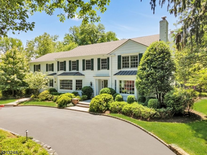 Located in the heart of Old Short Hills, this spectacular one-acre residence boasts tremendous curb appeal and every modern convenience. Elegantly refined, this home offers a classic floor plan and sophistication at every turn. Extensively renovated and expanded to exacting standards by David Rosen AIA, the heart of the home is a new open-concept kitchen complete with custom cabinetry, stone countertops, a large center island with walnut countertop, professional grade appliances, walk-in pantry and butler's pantry.  The kitchen flows seamlessly into an expansive breakfast room and family room with soaring ceilings. Walls of windows overlooking the park-like grounds offer breathtaking views, while a home office, library, 30' sunlit LR, formal DR, large mudroom and powder room complete the 1st floor. Upstairs, 5 bedrooms and 4 full baths provide a luxurious escape from daily life. The serene primary suite offers wonderful rear views while a second floor laundry center adds convenience. The lower level is an unexpected surprise, beautifully finished with 3 large recreation areas, exercise area, bar, wine cellar, full bath and extensive storage. One glimpse of the rear property with its expansive multi-level bluestone patios and alluring gunite pool will immediately end your home search. A large 3-car garage with loft storage completes this dream home. Ideally located in the Hartshorn school district and close to the NJ Transit Midtown Direct train line, this home is a rare find.