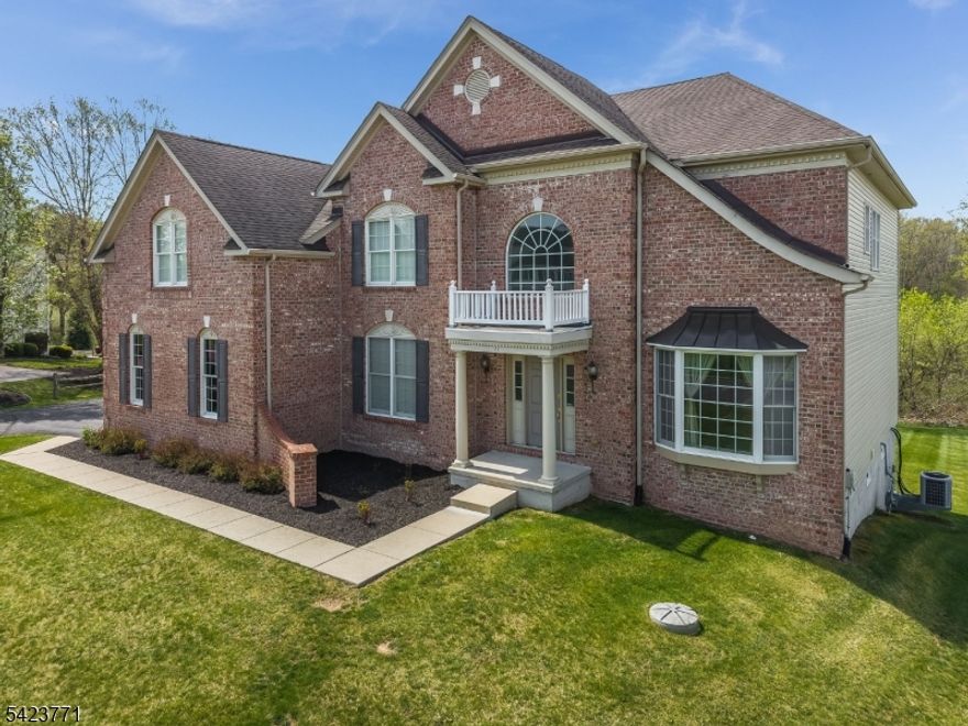 Welcome to this stunning 4 bedroom, 3.5-bath Hopewell Federal Model From the moment you step into the grand two-story foyer, it's clear that exceptional attention to detail and quality craftsmanship are present throughout. This light-filled, open floor plan features gleaming hardwood floors and an elegant flow perfect for both everyday living and entertaining. The spacious eat-in kitchen is the heart of the home, complete with a center island, Corian countertops, pantry, and abundant cabinetry. It opens seamlessly to the main living areas. The first floor also offers a private study, formal living and dining rooms, a convenient laundry room, and a secondary staircase. Upstairs, the expansive primary suite is a true retreat, featuring two walk-in closets, a separate sitting room, and a luxurious en-suite bath with a jetted tub, dual vanities, and a stall shower. Three additional generously sized bedrooms and two full baths provide ample space for everyone. Additional highlights include a three-car garage and two updated gas heating systems for efficiency and comfort.