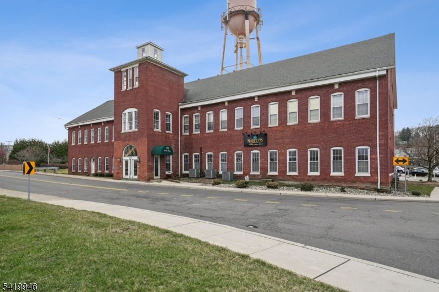 Great Investment & Opportunity to own approximately 20,000 square foot all Brick Building on 1.51 Acres that is mixed use with Offices and a Restaurant. Comes with a Liquor License being used by the Restaurant (Norte175). Restaurant Has Security & Sprinkler System. This once Silk Mill was built in 1885 sits on Washington Forge Pond with a Dam/Waterfall running along the side of the building with serene sounds and setting.  Office Spaces from 250 sq ft to 4500 sq ft.  Existing Tenants include Architects, Photography Studio, Art Studio, Engineering Group, Training Group, Psychologist, and a Religious Group.  Features 14 Foot Ceilings, 15" to 25" Column Spacing and charming Brick Walls. With a Use Variance Approval - 2nd Level Can be approved for Residential (Condos & Rentals). There is an possible Easement in discussion for the Decommissioned Water Tower Licensed for Cellular Antennas. Close to Rt 80, Rt. 46 & Rt. 15.  Close to Dover & Mt. Arlington Train Stations and NYC Buses.  There are 40 Surface Parking Spaces.  Unique Opportunity Awaits!