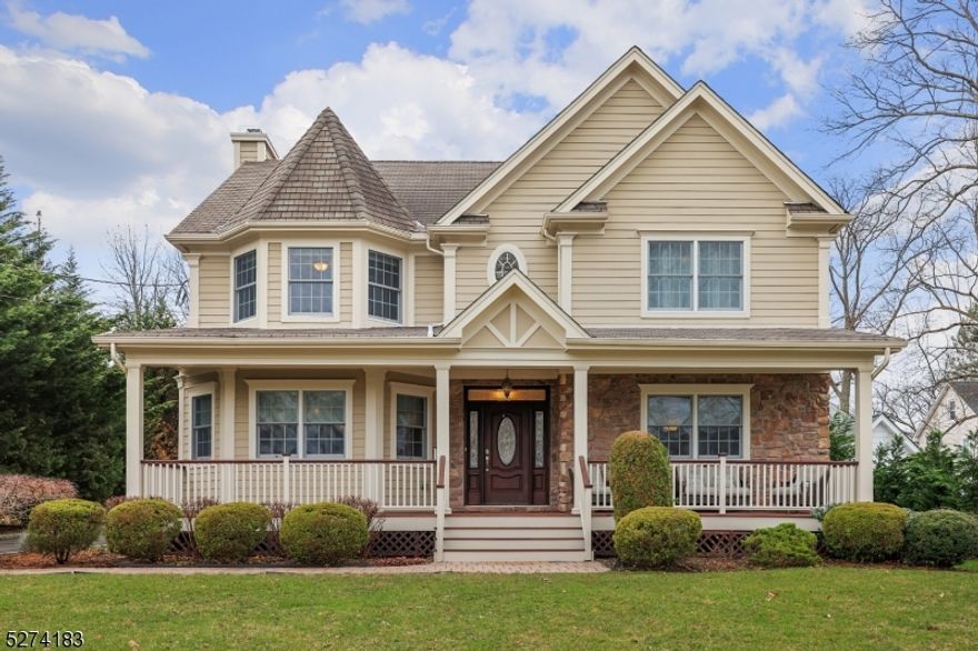 IMPECCABLE TURN-KEY SPACIOUS LIVING in a Prime North-Side Location, Moments from Downtown Westfield and Top-rated Schools. The enchanting front porch sets the tone for this gracious home. Inside, gleaming hardwood floors and high ceilings create an atmosphere of openness and refinement. A two story foyer welcomes you into the formal living and dining rooms. The heart of the home is the spacious family room featuring a gas fireplace open to a huge kitchen. The kitchen features a large island with a breakfast bar, an eat-in area, granite countertops, stainless steel appliances including a Viking 6-burner stove. The butler's pantry, complete with a wine fridge, makes entertaining a breeze. Step outside to discover a serene patio area for outdoor dining and enjoying the expansive backyard. A powder room and laundry/mudroom complete the main level. On the 2nd level, you'll find 5 bedrooms, all generously sized with great closet space. The primary retreat features a soaring ceiling, walk-in closet, vanity area, and a luxe ensuite bathroom. Two bedrooms share a Jack-and-Jill bathroom, while the hall bath serves the remaining 2 bedrooms, ensuring convenience for all. Custom closets throughout. A 2-car garage adds practicality, while the vast basement presents excellent potential for additional finished space with high ceilings. The walk-up attic offers easy access to storage and even more possibilities! Enjoy living minutes from NYC transportation, downtown shopping and restaurants.