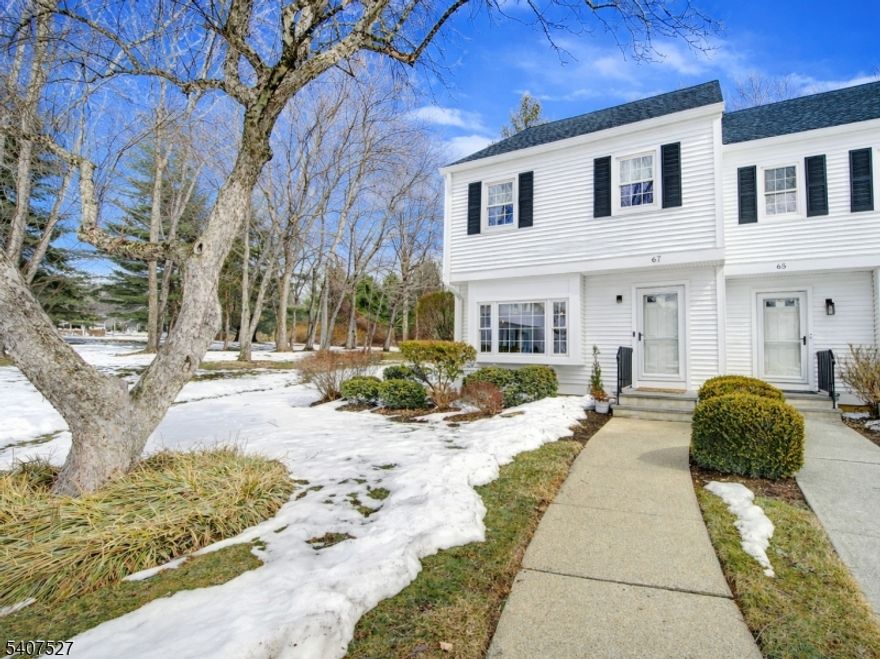 Highly desirable Mendham Commons, is known for its exceptional amenities and prime location. This sun-filled home offers two spacious bedrooms and one-and-a-half baths, thoughtfully renovated and upgraded throughout. The modern kitchen features updated cabinetry, a center island, stainless steel hood, quality appliances,and a dining area with sliders leading to the private patio. Upstairs, the large, fully renovated bath connects to both bedrooms and showcases contemporary finishes and comfort. The convenience of second-floor laundry enhances everyday living, while both bedrooms offer generous space and natural light. As an end unit, this home enjoys added privacy and extra windows, creating a bright and airy atmosphere. The full basement provides laundry, storage, and excellent potential for additional living space. Residents of Mendham Commons enjoy beautifully maintained grounds and a wide range of amenities, including both indoor and outdoor swimming pools, tennis courts, a clubhouse, and walking paths. The community is ideally located close to shopping, dining, and just 7 miles from Morristown. Public utilities are included, and the association has recently replaced the roof. Additional features include wood floors, recessed lighting, and a neutral palette throughout. This move-in-ready townhouse offers the perfect blend of comfort, style, and convenience. 2 assigned parking spots  - roof & siding have been recently replaced