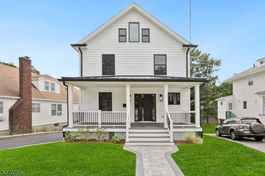 Newly renovated Colonial in desirable Caldwell, NJ, featuring 4 bedrooms, 4.5 bathrooms, and a bright open-concept layout. Set on a level lot with a charming front porch, this home blends classic curb appeal with modern updates throughout.The main level offers an inviting floor plan with updated flooring, recessed lighting, and a sleek, modern kitchen that opens seamlessly to the dining and living areas perfect for both everyday living and entertaining. Upstairs includes four bedrooms, including a primary suite with a private ensuite bath and a walk-in closet. A finished attic provides flexible bonus space, ideal for a home office, media room, or guest suite. Exterior highlights include a double garage, an extended driveway with ample parking, and a freshly updated front porch that enhances the home's charm. The finished walkout basement with a full bath adds even more living space.Just minutes from downtown Caldwell's restaurants, caf s, and boutique shops. Outdoor enthusiasts will enjoy nearby Grover Cleveland Park with trails, playgrounds, and wide-open space. Easy access to NYC transit, and close proximity to major highways.