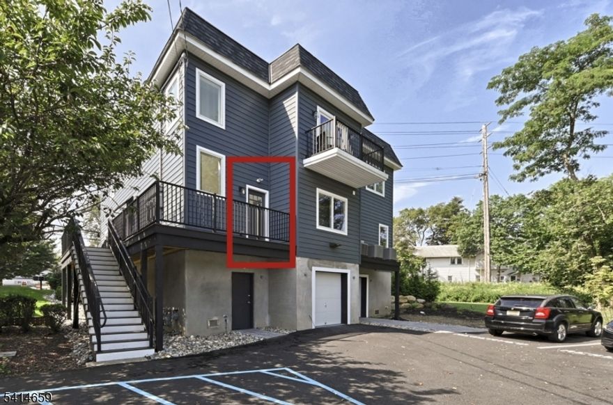 If you like NEW, you will immediately appreciate this refined 700+ sq ft unit in Pequannock! Built in 2022, the open-plan layout is ideal for entertaining or a cozy night at home. Designed to perfection, enjoy high-9ft ceilings, tons of natural light, hardwood floors and center kitchen island! The primary bedroom does not disappoint w/ glass sliders to exposed brick balcony! In-unit laundry, Central AC and parking!