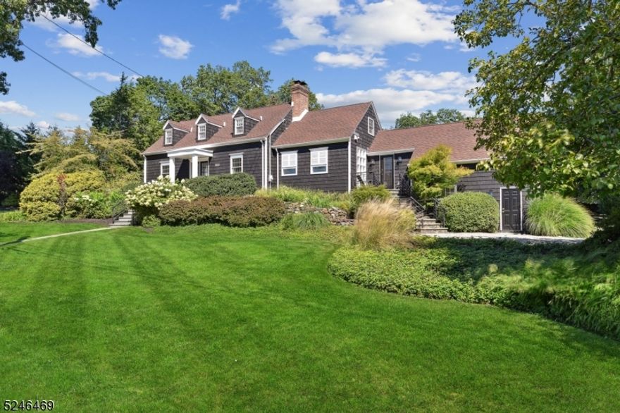 Elegance, Space and Style: 5 Bedroom Retreat in Coveted Neighborhood Nestled in the Heart of Wychwood. This exquisite home offers the ideal blend of traditional and modern living. From its clean lines and unique wall of windows to its lush, mature landscaping, every detail of this property exudes minimalism with sophistication and comfort. With five generously sized bedrooms, there is no shortage of space. Each bedroom offers an abundance of natural light, creating a warm and inviting atmosphere. This home caters to the modern lifestyle with several options for a dedicated home office that are perfect for remote work. Additionally, a home gym awaits fitness enthusiasts. The chef's dream kitchen is adorned with top-of-the-line appliances, quartz counters, an oversized island, wine refrigerator and ample storage space. Step outside to discover the beautifully landscaped grounds that surround the property. A stone patio provides a serene retreat for outdoor dining and relaxation. Professionally installed up lighting and overhead bistro lights accent the natural beauty of the landscaping, creating an enchanting ambiance in the evenings.  Additional highlights include 4   updated bathrooms, abundant built-in custom storage throughout the home, a two-car garage with epoxy flooring, custom cabinetry, bike storage, and modern door, and a gas fireplace in the living room/dining room. Schedule a viewing today to experience the seamless harmony of style and function that awaits you.