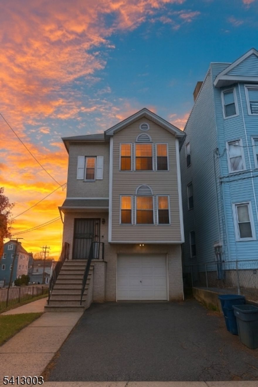 Indulge in the opportunity to own this elegant, spacious legal 2-family residence with a finished basement, offering scale and functionality. The first floor features 3 bedrooms and 2 bathrooms. The second floor mirrors the expansive 3-bedroom, 2-bath layout, providing generous living space and versatility. The finished basement includes 2 bedrooms and 1 full bath. The fully renovated third floor in 2025 showcases modern finishes, updated kitchen, and refreshed baths. Well maintained throughout, this property offers strong income potential and long-term upside for investors or owner-occupants. A private garage and carport provide convenient off-street parking and added functionality. Any staging is virtual.