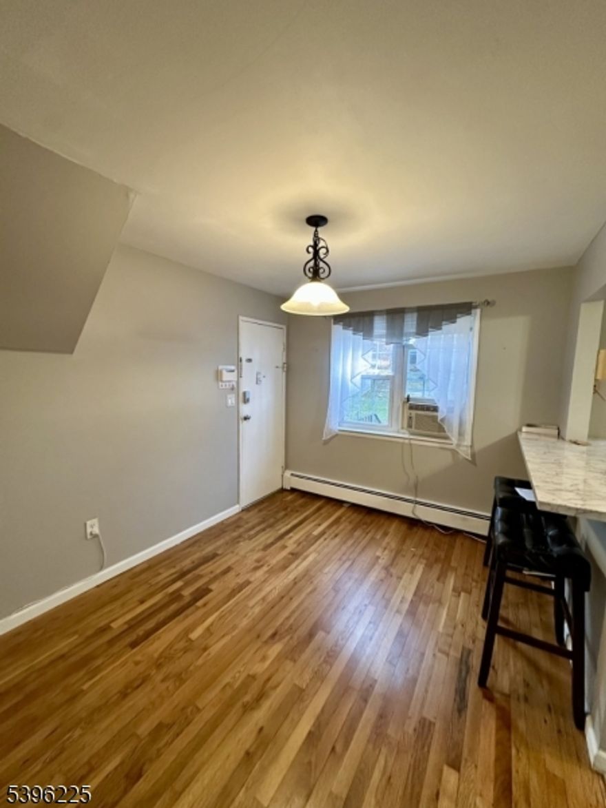 Great end unit 1 bedroom apartment. Hardwood floors throughout. In unit washer and dryer for your convenience, new stove, fridge, wall ac unit, and washer / dryer. Apartment also comes with a detached garage! Water, gas, and heat included!