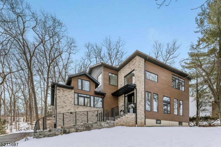 Nestled in the heart of Livingston, this modern 5-bedroom, 5.5-bathroom residence epitomizes luxury living. Spanning approximately 5,000 sf of total living space built and designed by Bach Development, this meticulously crafted home offers an unparalleled blend of mode and sophistication.As you step through the grand entrance, you're immediately greeted by the timeless allure of white oak floors, custom engineered floating stairs seamlessly leading you through the expansive living spaces. Bathed in natural light, the open floor plan creates an inviting atmosphere, perfect for both relaxation and entertaining.The heart of this home is undoubtedly the high-end kitchen, featuring top-of-the-line Viking and Miele appliances, custom cabinetry, and quartz countertops. Retreat to the luxurious master suite, where tranquility awaits. BOAsting a spa-like ensuite bathroom with soaking tub and oversized shower, as well as a spacious walk-in closet, this private sanctuary offers the ultimate in comfort and relaxation.Each additional bedroom is generously sized and thoughtfully appointed, providing ample space.