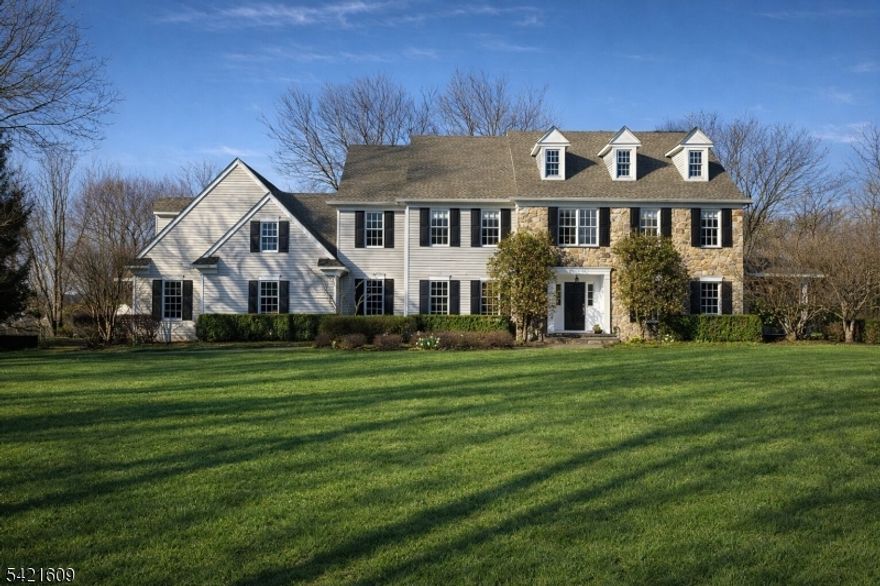 Welcome home! Step inside 15 Ramsey Road in the coveted Hill View Farms neighborhood. Set on a quiet cul-de-sac on 3.42 acres, this tastefully refreshed and meticulously maintained 1998 model home offers a rare blend of peaceful country living and everyday convenience. A wooded creek frames the property, creating a serene backdrop, while shopping, dining, and commuter routes remain easily accessible. Quality and attention to detail are evident upon arrival, highlighted by the newly repaved driveway, pristine 3-car garage with epoxy flooring, Level-2 EV charger, and newer roof (2022). Inside, a seamless open-concept layout connects the gourmet kitchen with Wolf 6-burner range, breakfast area, family room, and office with custom built-ins, along with a sunlit west-facing patio. Detailed moldings throughout add warmth and character. Upstairs, four spacious bedrooms include a luxurious primary suite with spa-like bath featuring a steam shower and soaking tub, as well as two walk-in closets. Among the four bedrooms, two are connected by a Jack-and-Jill bath, one with a walk-in closet, ideal for guests or extended stays. A finished third-floor recreation room adds flexibility, while the full unfinished basement with high ceilings and direct garage access offers excellent potential. Outdoors, enjoy a covered porch, brick patio, fenced garden, and professionally landscaped grounds. A home that offers a true sense of comfort: inviting, functional, and thoughtfully designed.